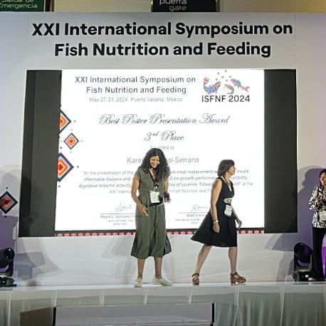 Student receiving award on stage