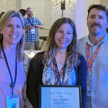 Person holding award