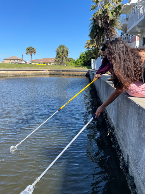People by water with cteno dippers